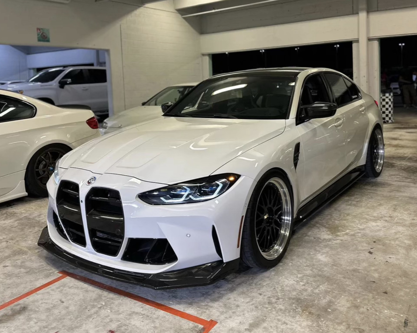 Modified white BMW G80 M3 on BBS wheels