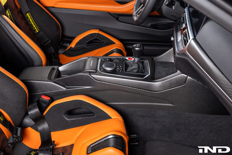 carbon fiber center console armrest shift surround karbonius ind distribution m3list m3parts bmw g80 m3 g82 m4 g83 m4 g87 m2 pricing price cost for sale interior modifications mods g8xm3 g8xm4 g8xm2