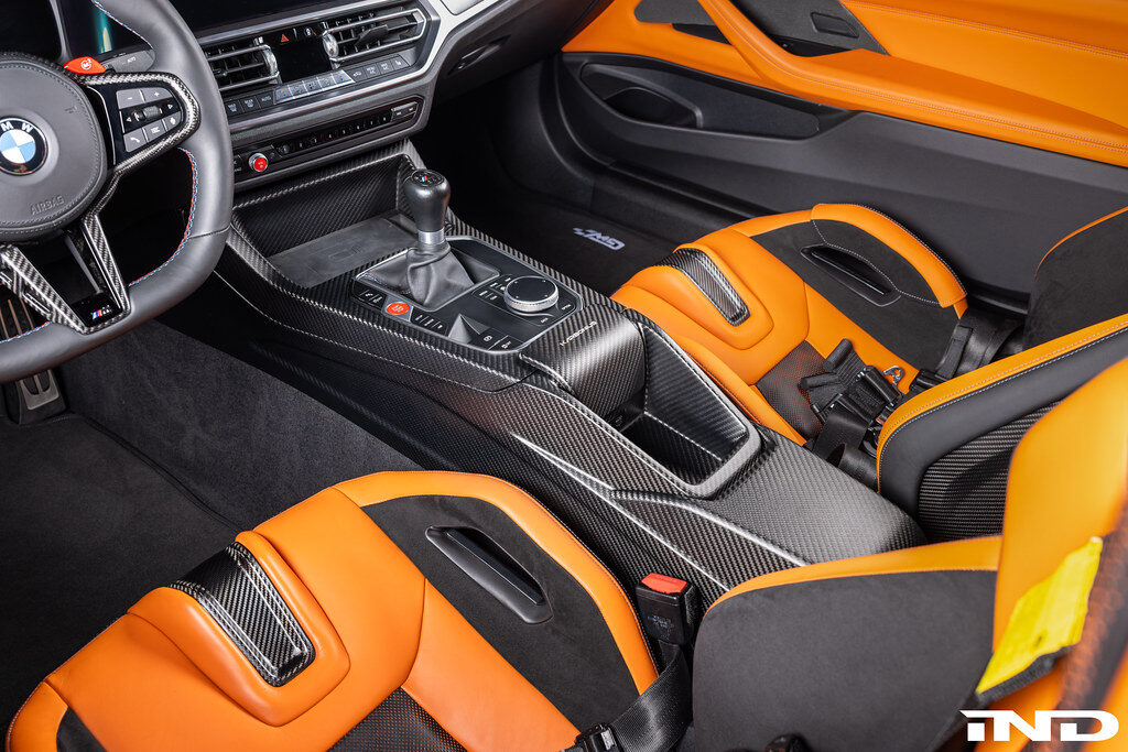 carbon fiber center console armrest shift surround karbonius ind distribution m3list m3parts bmw g80 m3 g82 m4 g83 m4 g87 m2 pricing price cost for sale interior modifications mods g8xm3 g8xm4 g8xm2